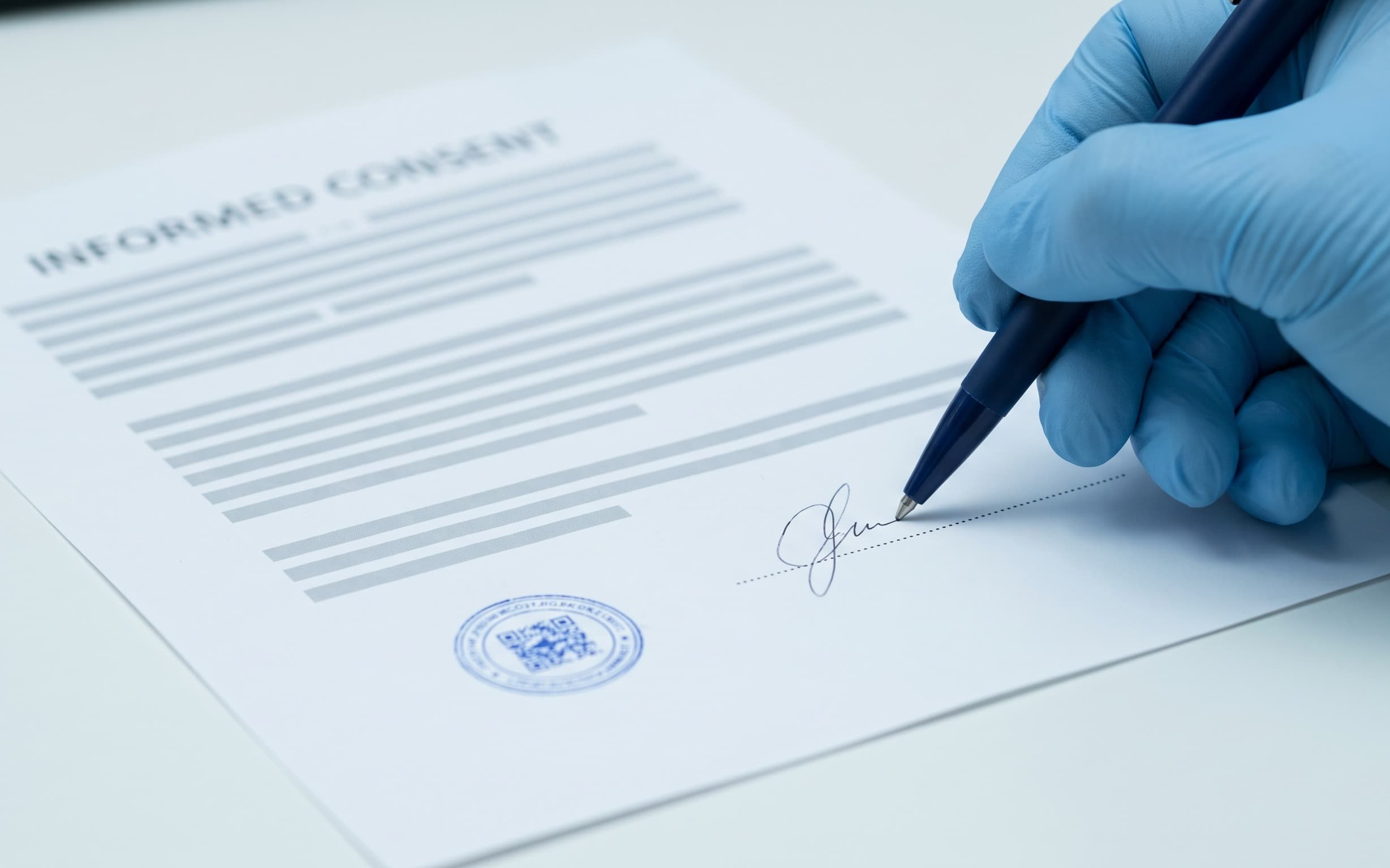 Informed consent form being signed